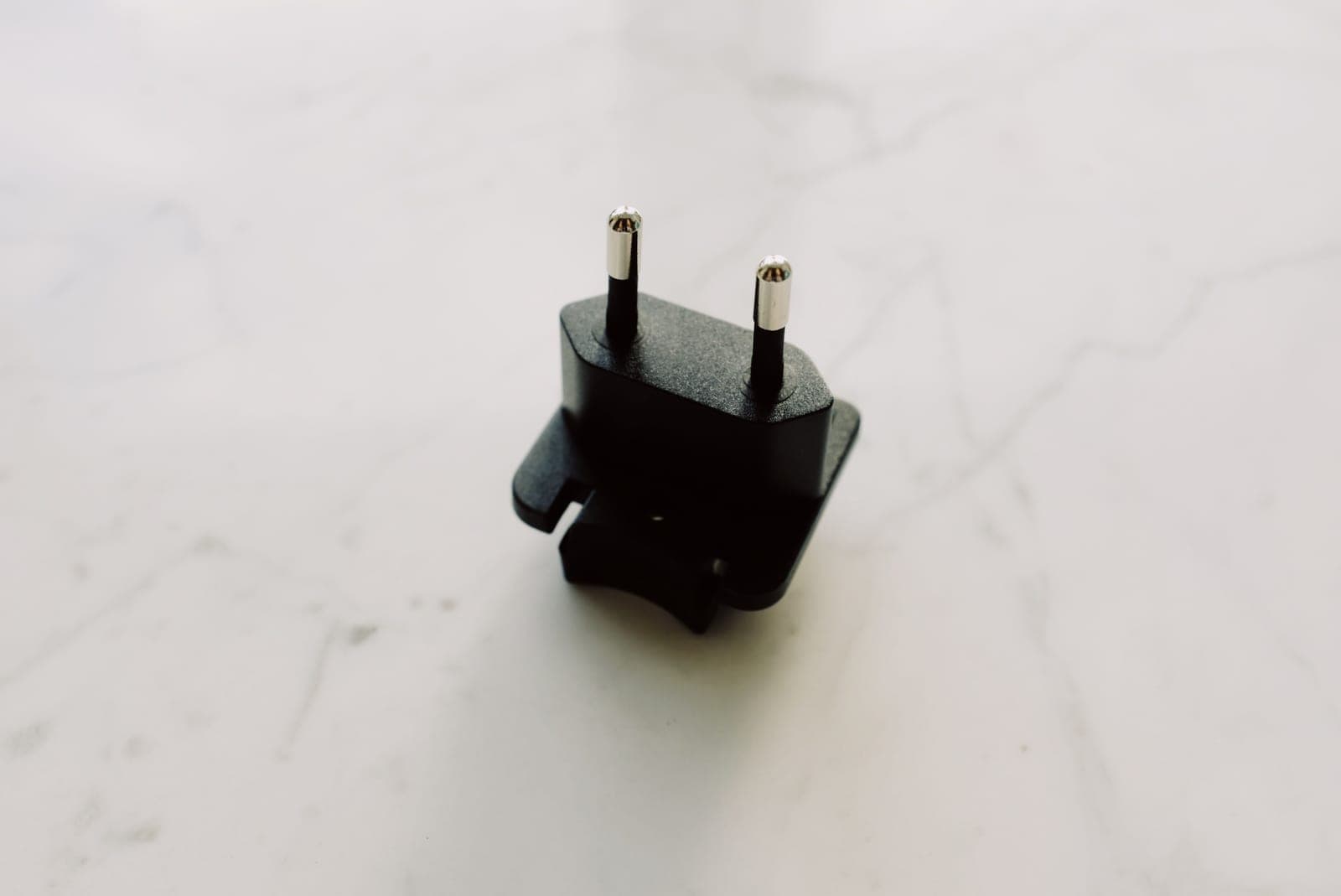 Close-up detail of an electrical charging adapter connector