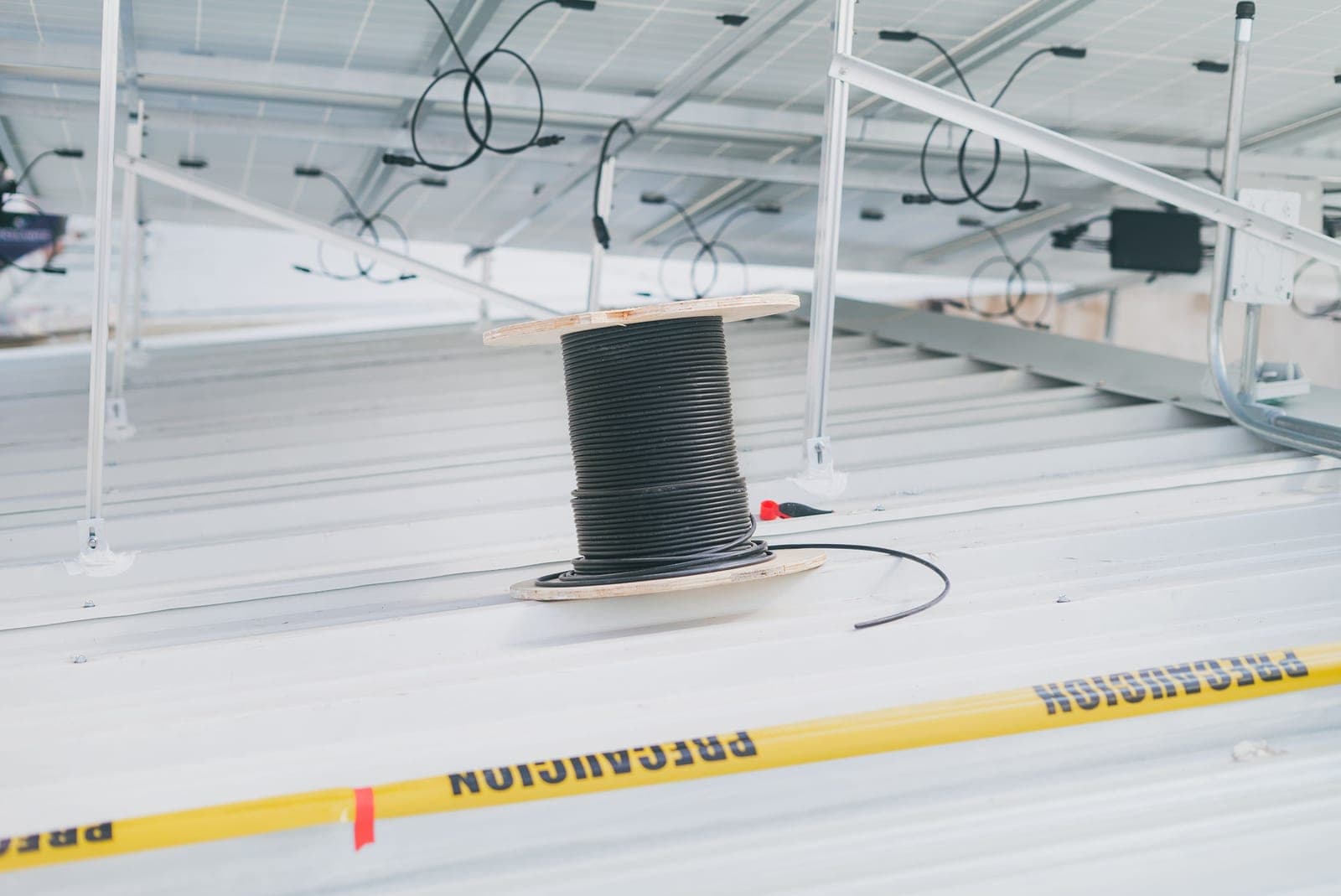 A coiled power cord on a reel