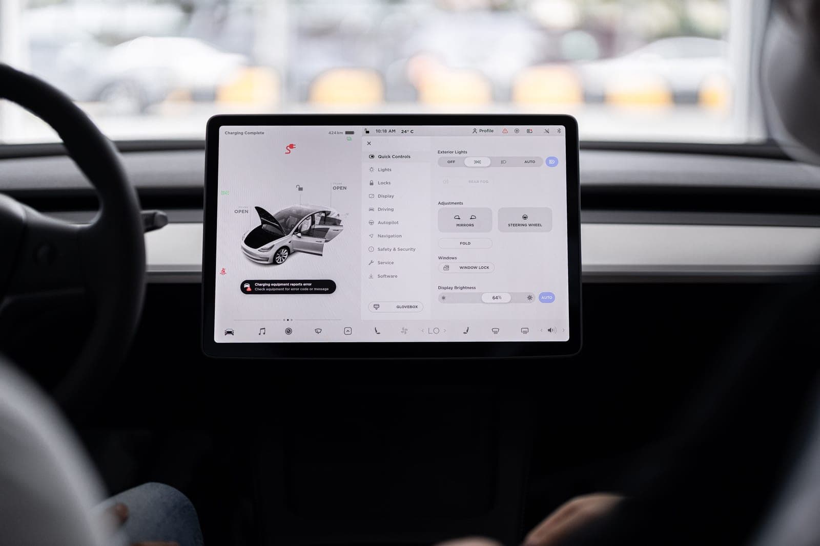 An electric car dashboard display showing charge status