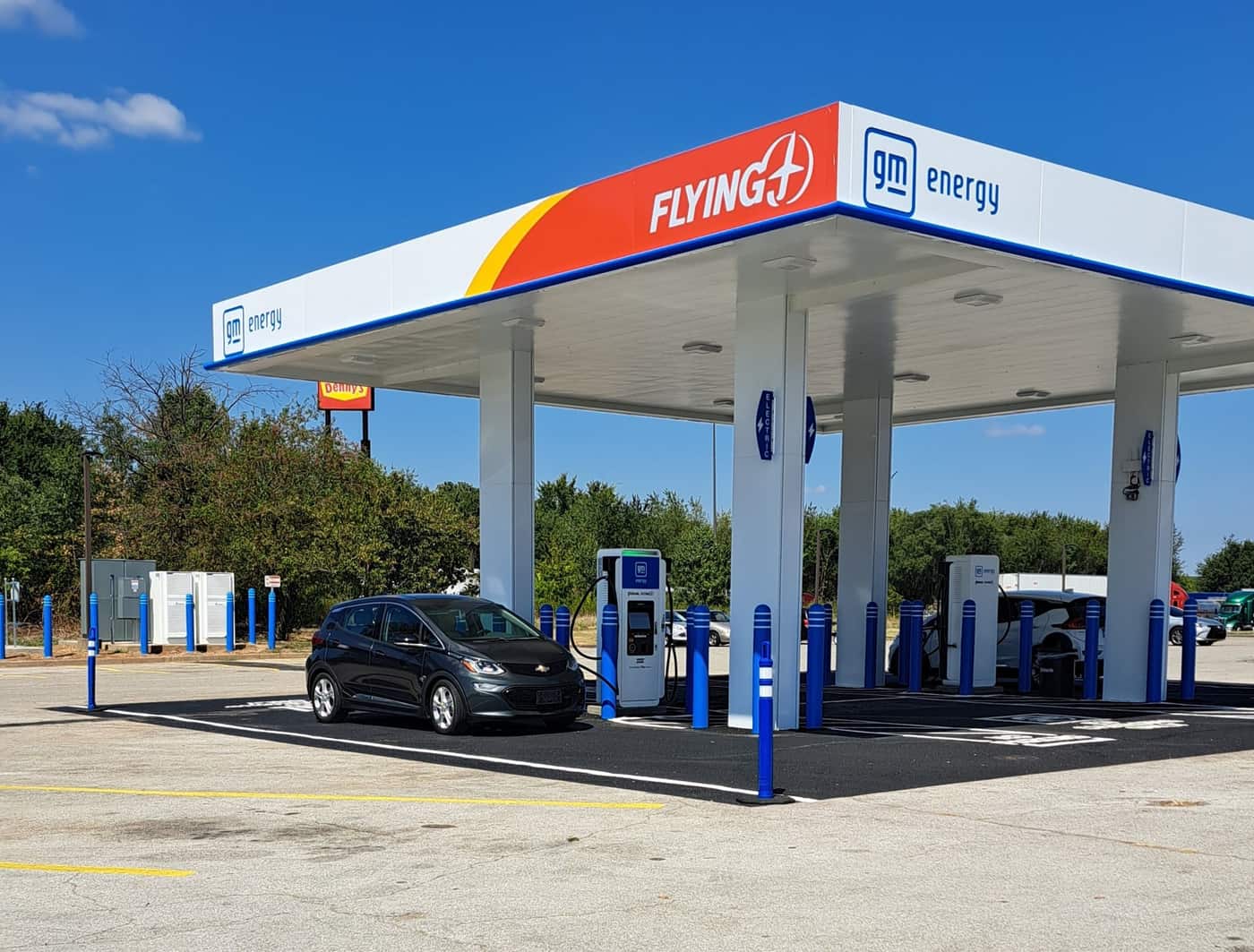 A Chevrolet Bolt EV charging at a GM Energy fast-charging canopy in Kentucky