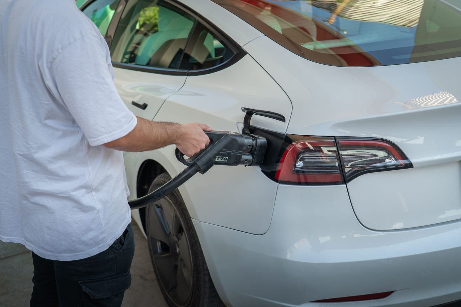 The charging port on the rear of an electric car